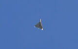 A Shahed-136 drone is seen in the sky seconds before it hit buildings in Kyiv, Ukraine, October 17, 2022. (AP Photo/Efrem Lukatsky)