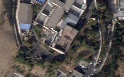 This is a cropped image of the satellite photo from Planet Labs PBC shows Evin prison in Tehran, Iran, October 16, 2022, after a fire at the complex amid ongoing national protests in the country. (Planet Labs PBC via AP)
