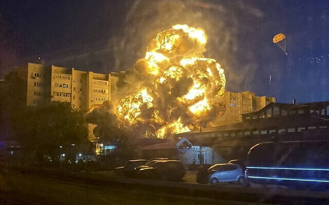 In this handout photo released by Kooperativ Telegram Channel, flames and smoke rise from the scene after a warplane crashed into a residential area in Yeysk, Russia, October 17, 2022. (Kooperativ Telegram Channel via AP) In this handout photo released by Kooperativ Telegram Channel, flames and smoke rise from the scene after a warplane crashed into a residential area in Yeysk, Russia, October 17, 2022. (Kooperativ Telegram Channel via AP)