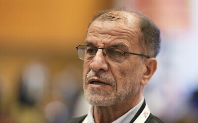 The president of Iran's national Olympic committee (NOC), Mahmoud Khosravi Vafa, answers a reporter's question during an interview in Seoul, South Korea, October 20, 2022. (AP/Lee Jin-man)