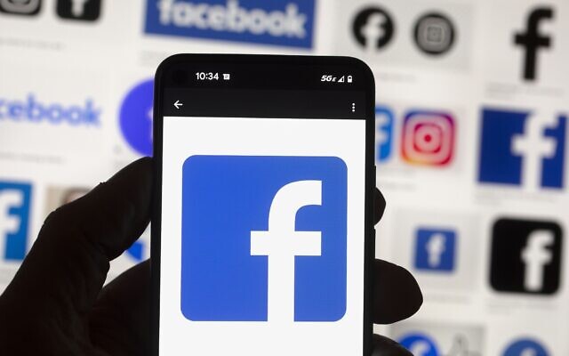 FILE - The Facebook logo is seen on a mobile phone, Oct. 14, 2022, in Boston. (AP Photo/Michael Dwyer, File) FILE - The Facebook logo is seen on a mobile phone, Oct. 14, 2022, in Boston. (AP Photo/Michael Dwyer, File)