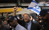 Israeli far-right MK and Otzma Yehudit leader Itamar Ben Gvir visits Hatikva Market in Tel Aviv during his campaign ahead of the November election, October 21, 2022. (AP Photo/Oded Balilty)