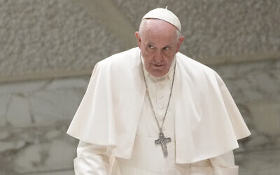 Pope Francis arrives for an audience with members of the International Christian Union of Business Executives, in the Pope Paul VI hall at the Vatican, October 21, 2022. (AP Photo/Andrew Medichini)