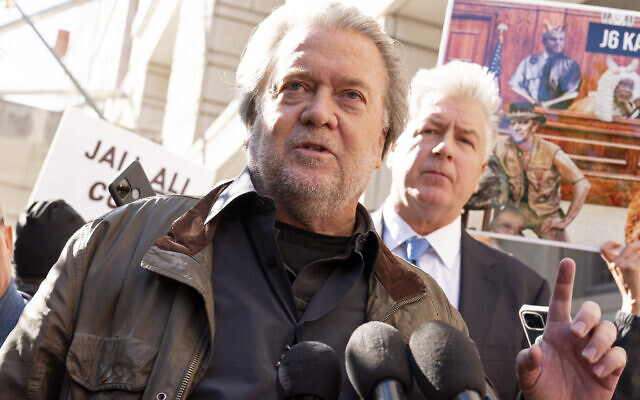 Steve Bannon, center, a longtime ally of former President Donald Trump and convicted of contempt of Congress, accompanied by his attorney Evan Corcoran, right, speaks to the media as he leaves the federal courthouse on Friday, October 21, 2022, in Washington DC. (AP/Jose Luis Magana) Steve Bannon, center, a longtime ally of former President Donald Trump and convicted of contempt of Congress, accompanied by his attorney Evan Corcoran, right, speaks to the media as he leaves the federal courthouse on Friday, October 21, 2022, in Washington DC. (AP/Jose Luis Magana)