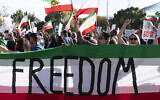 US demonstrators rally at the National Mall to protest against the Iranian regime, in Washington, DC, October 22, 2022, following the death of Mahsa Amini in the custody of the Islamic Republic's notorious 'morality police' (AP Photo/Jose Luis Magana)