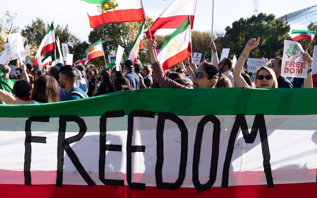 US demonstrators rally at the National Mall to protest against the Iranian regime, in Washington, DC, October 22, 2022, following the death of Mahsa Amini in the custody of the Islamic Republic's notorious 'morality police' (AP Photo/Jose Luis Magana)