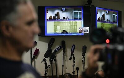 WNBA star and two-time Olympic gold medalist Brittney Griner is seen on the bottom part of a TV screen as she waits to appear in a video link provided by the Russian Federal Penitentiary Service a courtroom prior to a hearing at the Moscow Regional Court in Moscow, Russia, October 25, 2022. (AP Photo/Alexander Zemlianichenko) WNBA star and two-time Olympic gold medalist Brittney Griner is seen on the bottom part of a TV screen as she waits to appear in a video link provided by the Russian Federal Penitentiary Service a courtroom prior to a hearing at the Moscow Regional Court in Moscow, Russia, October 25, 2022. (AP Photo/Alexander Zemlianichenko)