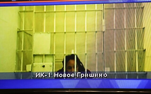 WNBA star and two-time Olympic gold medalist Brittney Griner is seen on the bottom part of a TV screen as she waits to appear in a video link provided by the Russian Federal Penitentiary Service a courtroom prior to a hearing at the Moscow Regional Court in Moscow, Russia, October 25, 2022. (AP Photo/Alexander Zemlianichenko) WNBA star and two-time Olympic gold medalist Brittney Griner is seen on the bottom part of a TV screen as she waits to appear in a video link provided by the Russian Federal Penitentiary Service a courtroom prior to a hearing at the Moscow Regional Court in Moscow, Russia, October 25, 2022. (AP Photo/Alexander Zemlianichenko)