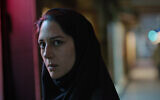 This image released by Utopia shows Zar Amir Ebrahimi in a scene from "Holy Spider." Ebrahimi stars as a journalist investigating a serial killer in the eastern Iranian city of Mashhad who is murdering women and sex workers. (Utopia via AP)