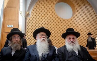 United Torah Judaism chairman Yitzchak Goldknopf and MKs Ya'akov Tessler and Meir Porush arrive for a court hearing on a petition against the kosher cell phone reform, at the Supreme Court in Jerusalem, July 28, 2022. (Yonatan Sindel/Flash90) United Torah Judaism chairman Yitzchak Goldknopf and MKs Ya'akov Tessler and Meir Porush arrive for a court hearing on a petition against the kosher cell phone reform, at the Supreme Court in Jerusalem, July 28, 2022. (Yonatan Sindel/Flash90)