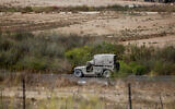 Illustrative: Israeli soldiers are seen near the scene of a shooting attack, near the West Bank settlement of Shavei Shomron, on October 11, 2022. (Nasser Ishtayeh/Flash90)