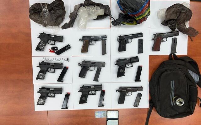Weapons seized by security forces after an alleged gun-smuggling over the border with Jordan on October 12, 2022. (Israel Police) Weapons seized by security forces after an alleged gun-smuggling over the border with Jordan on October 12, 2022. (Israel Police)