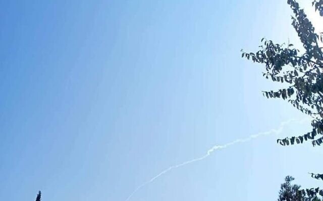 A trail of smoke is reportedly seen over the Syrian capital Damascus amid an alleged Israeli airstrike, October 24, 2022. (Social media) A trail of smoke is reportedly seen over the Syrian capital Damascus amid an alleged Israeli airstrike, October 24, 2022. (Social media)
