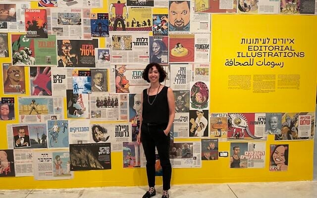 Tal Lanir, curator of 'Illustrations: David Polonsky' at the Tel Aviv Museum of Art through February 18, 2023. (Jessica Steinberg/Times of Israel)