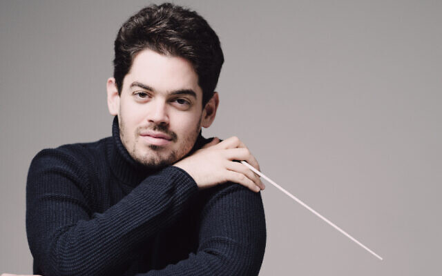 A 2022 photograph of Lahav Shani, artistic director and chief conductor of the Israel Philharmonic. (Courtesy IPO)