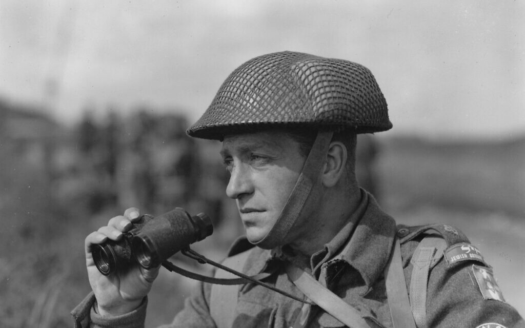 A platoon leader in the 3rd Bn. of the Jewish Brigade Lt. Max Weiner, originally from Dresden, Germany, and now from Palestine. Weiner, with his Jewish Brigade insignia clearly visible on his left sleeve was in the area of Pideura, Italy March, 1945. (Photographer: Levine, 196th Signal Photo Co./Signal Corps Archive from United States, Public domain, via Wikimedia Commons)