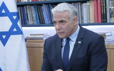 Prime Minister Yair Lapid speaks to Arab media outlet Panet, aired October 18, 2022. (Screenshot/Panet: used in accordance with Clause 27a of the Copyright Law) Prime Minister Yair Lapid speaks to Arab media outlet Panet, aired October 18, 2022. (Screenshot/Panet: used in accordance with Clause 27a of the Copyright Law)