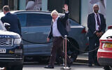 Former British prime minister Boris Johnson arrives at Gatwick Airport in London, after traveling on a flight from the Caribbean, October 22, 2022. (Gareth Fuller/PA via AP, File)