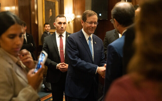 President Isaac Herzog shakes hands with Jewish American leaders in Washington on October 25, 2022. (Luke Tress/Times of Israel) President Isaac Herzog shakes hands with Jewish American leaders in Washington on October 25, 2022. (Luke Tress/Times of Israel)