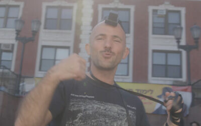 Kosha Dillz in his video "Death Con 3." (Screenshot/YouTube, used in accordance with Clause 27a of the Copyright Law)