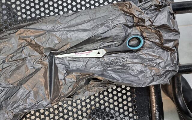 Scissors a Palestinian woman stabbed a prison guard with at the Ramon Prison in southern Israel, October 2, 2022. (Israel Prison Service) Scissors a Palestinian woman stabbed a prison guard with at the Ramon Prison in southern Israel, October 2, 2022. (Israel Prison Service)