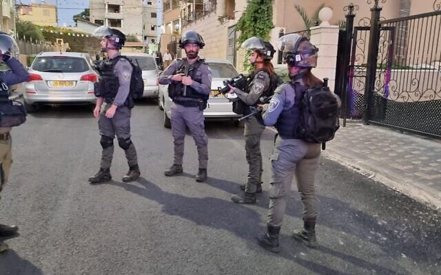 File: Police at the scene of a murder in Jadeidi-Makr on October 7, 2022. (Israel Police)
