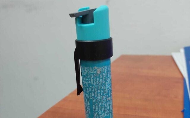 A photo from the Israel Police on October 29, 2022, shows a canister of pepper spray allegedly using during a brawl at an anti-Netanyahu protest in the central coastal city of Netanya. (Israel Police) A photo from the Israel Police on October 29, 2022, shows a canister of pepper spray allegedly using during a brawl at an anti-Netanyahu protest in the central coastal city of Netanya. (Israel Police)
