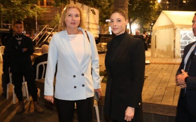 Former minister Tzipi Livni (L) and Labor party chief Merav Michaeli at Zion Square in Jerusalem for a rally to mark 27 years since the assassination of former prime minister Yitzhak Rabin, October 29, 2022. (Raanan Cohen) Former minister Tzipi Livni (L) and Labor party chief Merav Michaeli at Zion Square in Jerusalem for a rally to mark 27 years since the assassination of former prime minister Yitzhak Rabin, October 29, 2022. (Raanan Cohen)