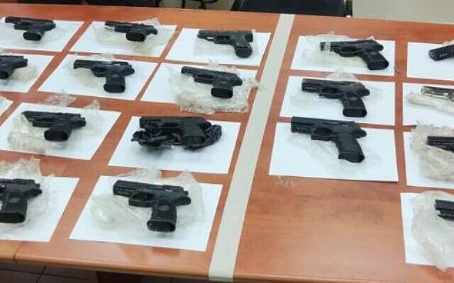 Weapons seized by security forces after an alleged gun-smuggling over the border with Jordan on October 31, 2022. (Israel Defense Forces) Weapons seized by security forces after an alleged gun-smuggling over the border with Jordan on October 31, 2022. (Israel Defense Forces)