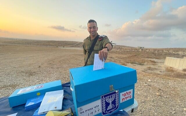 An IDF officer votes in Israel's general elections at a base in southern Israel, October 31, 2022. (Israel Defense Forces)
