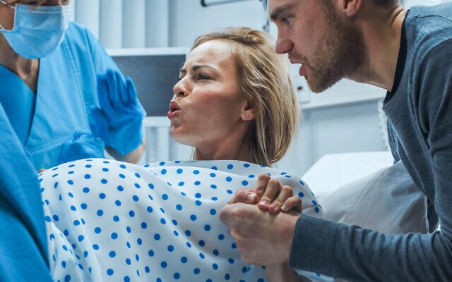 Illustrative image: a woman giving birth. (gorodenkoff via iStock by Getty Images) Illustrative image: a woman giving birth. (gorodenkoff via iStock by Getty Images)