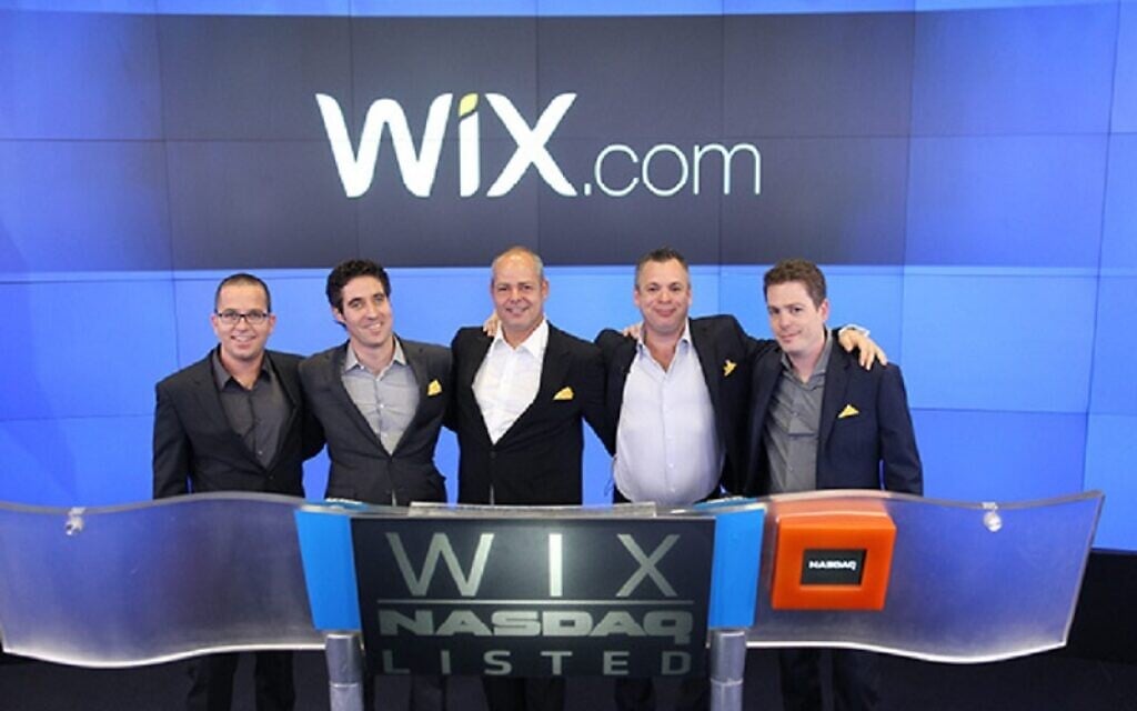 Wix CEO Avishai Abrahami (second from right) is joined by (left to right) CMO Omer Shai, President and COO Nir Zohar, Co-Founder and CTO Giora (Gig) Kaplan, and Co-Founder and VP Client Development Nadav Abrahami, November 2013. (Courtesy/Nasdaq/Wix) Wix CEO Avishai Abrahami (second from right) is joined by (left to right) CMO Omer Shai, President and COO Nir Zohar, Co-Founder and CTO Giora (Gig) Kaplan, and Co-Founder and VP Client Development Nadav Abrahami, November 2013. (Courtesy/Nasdaq/Wix)