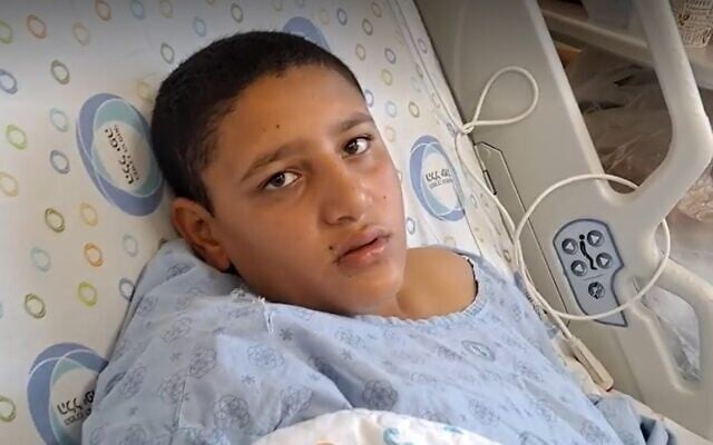 Wahed Jurban, who was shot in Jisr az-Zarqa, speaks from his hospital bed, October 29, 2022. (Video screen grab via Ynet; used in accordance with Clause 27a of the Copyright Law) Wahed Jurban, who was shot in Jisr az-Zarqa, speaks from his hospital bed, October 29, 2022. (Video screen grab via Ynet; used in accordance with Clause 27a of the Copyright Law)