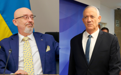 Defense Minister Benny Gantz, right, attends a cabinet meeting at the prime minister's office in Jerusalem, October 23, 2022; Ukraine's Defense Minister Oleksii Reznikov, left, gestures as he attends the meeting at Ramstein Air Base in Ramstein, Germany, April 26, 2022. (AP Photos/Abir Sultan via AP; Michael Probst)