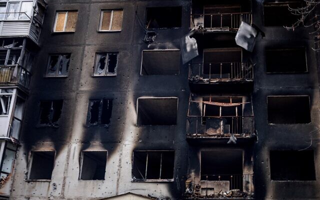 This photograph taken on October 31, 2022, shows a view of a burnt residental building after shelling in the frontline town of Bakhmut, in eastern Ukraine's Donetsk region, amid Russia's invasion of Ukraine. (Photo by Dimitar DILKOFF / AFP) This photograph taken on October 31, 2022, shows a view of a burnt residental building after shelling in the frontline town of Bakhmut, in eastern Ukraine's Donetsk region, amid Russia's invasion of Ukraine. (Photo by Dimitar DILKOFF / AFP)
