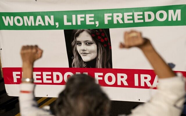 In this file photo taken on October 15, 202, demonstrators chant slogans while marching during the 'March of Solidarity for Iran' in Washington, DC. (Stefani Reynolds / AFP) In this file photo taken on October 15, 202, demonstrators chant slogans while marching during the 'March of Solidarity for Iran' in Washington, DC. (Stefani Reynolds / AFP)