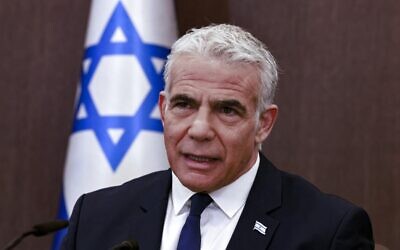 Prime Minister Yair Lapid heads a cabinet meeting in Jerusalem, on November 20, 2022. (Menahem KAHANA / POOL / AFP)