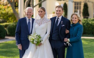 In this handout provided by The White House, President Joe Biden and First Lady Jill Biden attend the wedding of Peter Neal and Naomi Biden Neal on the South Lawn of the White House on November 19, 2022 in Washington DC.   (Adam Schultz/The White House via Getty Images/AFP)