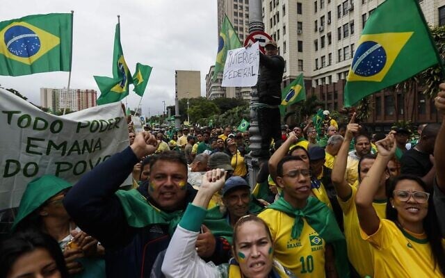 Supporters of President Jair Bolsonaro protest his defeat in the presidential runoff election, in Rio de Janeiro, Brazil, November 2, 2022. (AP Photo/Bruna Prado) Supporters of President Jair Bolsonaro protest his defeat in the presidential runoff election, in Rio de Janeiro, Brazil, November 2, 2022. (AP Photo/Bruna Prado)