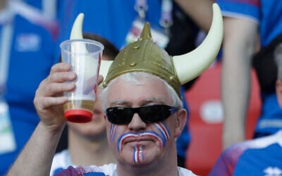 An Iceland fan toasts with a beer prior to the group D match between Argentina and Iceland at the 2018 soccer World Cup in the Spartak Stadium in Moscow, Russia, Saturday, June 16, 2018. (AP Photo/Matthias Schrader) An Iceland fan toasts with a beer prior to the group D match between Argentina and Iceland at the 2018 soccer World Cup in the Spartak Stadium in Moscow, Russia, Saturday, June 16, 2018. (AP Photo/Matthias Schrader)