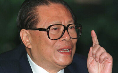 Chinese President Jiang Zemin at a press conference in Beijing, one day before his departure for an eight-day visit to the US, October 25, 1997. (AP Photo/Greg Baker, File)