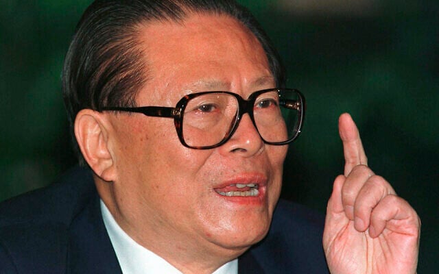 Chinese President Jiang Zemin at a press conference in Beijing, one day before his departure for an eight-day visit to the US, October 25, 1997. (AP Photo/Greg Baker, File)