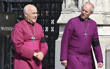 Archbishop of York Stephen Geoffrey Cottrell, left, and The Archbishop of Canterbury Justin Welby walk in central London, Sept. 14, 2022 ahead of the ceremonial procession of the coffin of Queen Elizabeth II, from Buckingham Palace to Westminster Hall, London. (Justin Tallis/Pool Photo via AP)