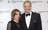 Speaker of the US House Nancy Pelosi, and her husband, Paul Pelosi, arrive at the State Department for the Kennedy Center Honors State Department Dinner, December 7, 2019, in Washington. (AP Photo/Kevin Wolf, File)