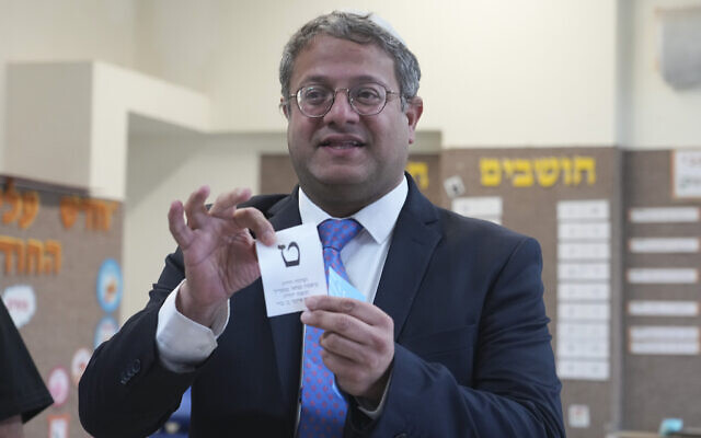 Israeli far-right lawmaker Itamar Ben Gvir shows his ballot in the West Bank settlement of Kiryat Arba during Israeli elections, November 1, 2022. (AP Photo/Tsafrir Abayov) Israeli far-right lawmaker Itamar Ben Gvir shows his ballot in the West Bank settlement of Kiryat Arba during Israeli elections, November 1, 2022. (AP Photo/Tsafrir Abayov)