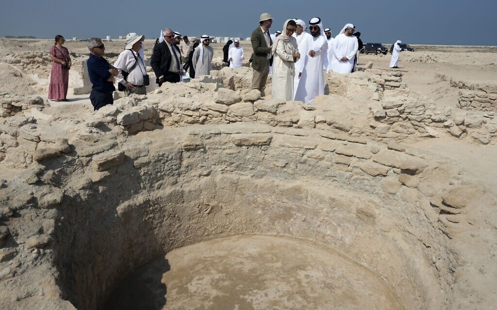 Sheikh Majid bin Saud Al Mualla, chairman of the Umm Al Quwain Department of Tourism and Archaeology, front right, with Noura Al Kaabi, UAE Minister of Culture and Youth, during a visit to the ancient Christian monastery on Siniyah Island in Umm al-Quwain, United Arab Emirates, November 3, 2022. (AP Photo/Kamran Jebreili) Sheikh Majid bin Saud Al Mualla, chairman of the Umm Al Quwain Department of Tourism and Archaeology, front right, with Noura Al Kaabi, UAE Minister of Culture and Youth, during a visit to the ancient Christian monastery on Siniyah Island in Umm al-Quwain, United Arab Emirates, November 3, 2022. (AP Photo/Kamran Jebreili)