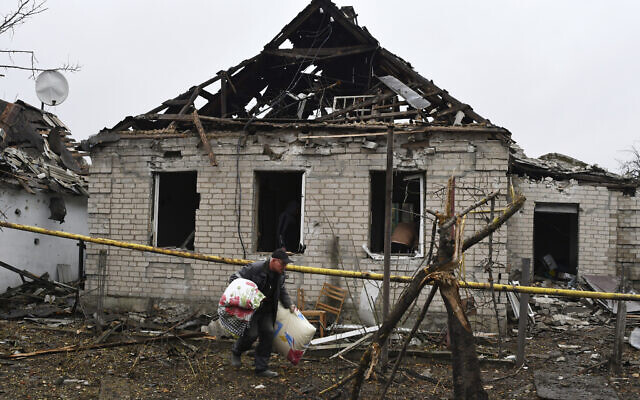 A man carries pillows from his destroyed apartment building after Russian shelling in Pokrovsk, Donetsk region, Ukraine, Nov. 4, 2022. (AP Photo/Andriy Andriyenko) A man carries pillows from his destroyed apartment building after Russian shelling in Pokrovsk, Donetsk region, Ukraine, Nov. 4, 2022. (AP Photo/Andriy Andriyenko)