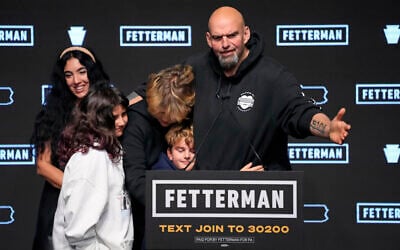 Pennsylvania Lt. Gov. John Fetterman, Democratic candidate for US Senate from Pennsylvania, right, is joined by his family after addressing supporters at an election night party in Pittsburgh, November 9, 2022. (Gene J. Puskar/AP)
