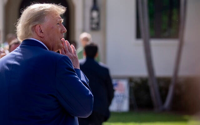 Former US president Donald Trump speaks to members of the media outside Morton and Barbara Mandel Recreation Center after voting on Election Day, November 8, 2022, in Palm Beach, Florida. (AP Photo/Andrew Harnik) Former US president Donald Trump speaks to members of the media outside Morton and Barbara Mandel Recreation Center after voting on Election Day, November 8, 2022, in Palm Beach, Florida. (AP Photo/Andrew Harnik)