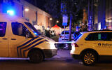 Police attend the scene of an incident in Brussels, Thursday Nov. 10, 2022. One police officer is dead and another injured in a stabbing attack in Brussels, which a Belgian judicial official says is suspected to be terrorism-linked. (AP Photo/Sylvain Plazy)